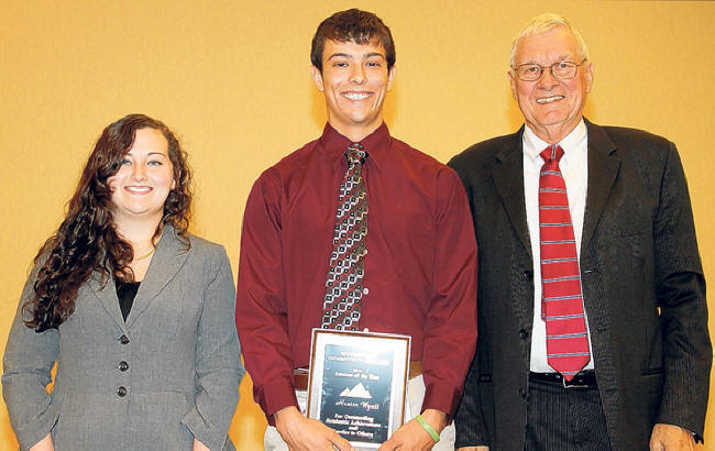 Laura Asbury receiving award