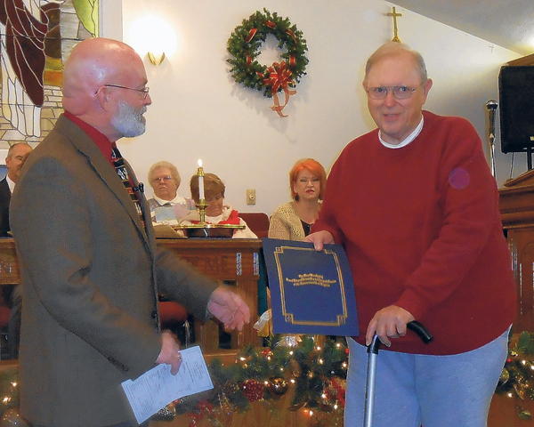 James Sink receiving the award